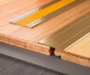 Алюмінієвий поріг Salag Stratus S09 з самоклеючою стрічкою 1.82 м золотий анодований S09F10